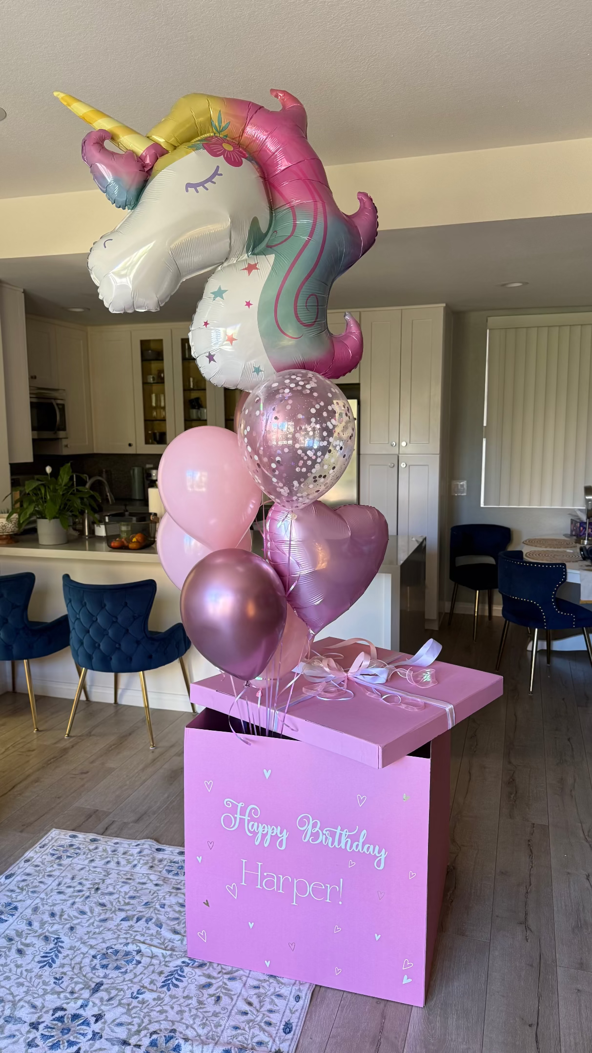 Personalized pink unicorn birthday balloon box with large unicorn foil balloon, pink helium balloons, rose metallic balloon, heart balloon, and confetti balloons for a girls’ birthday celebration in Los Angeles.